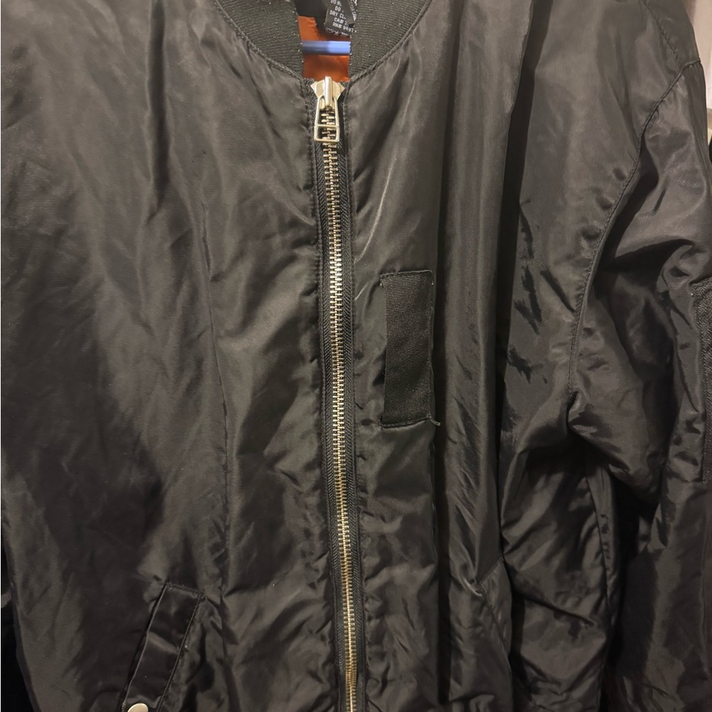 Stussy Black Varsity Bomber Jacket with Sleek Design